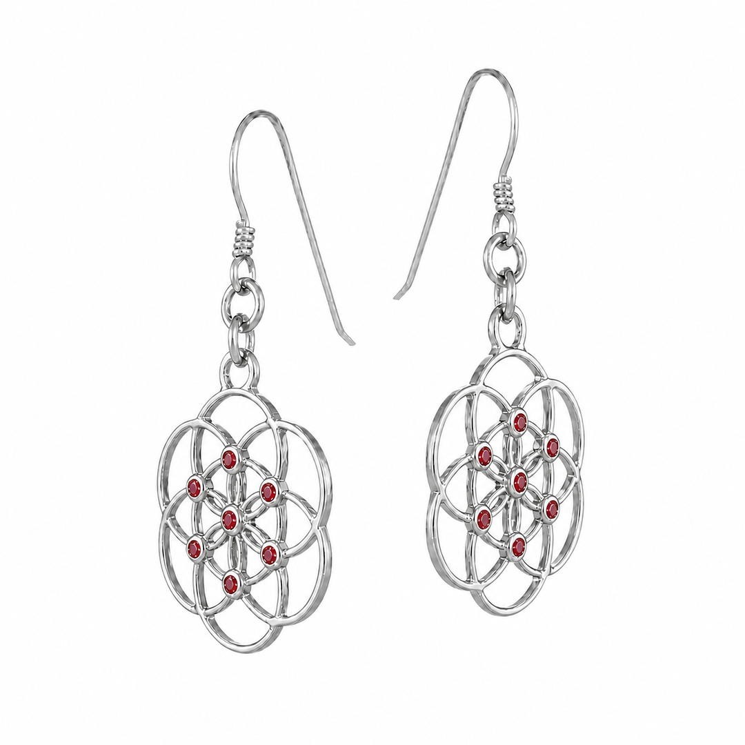 "Seed of Life" earrings with 7 rubies—a symbol of primordial energy—handcrafted from sterling silver by Eternal Bliss, side view