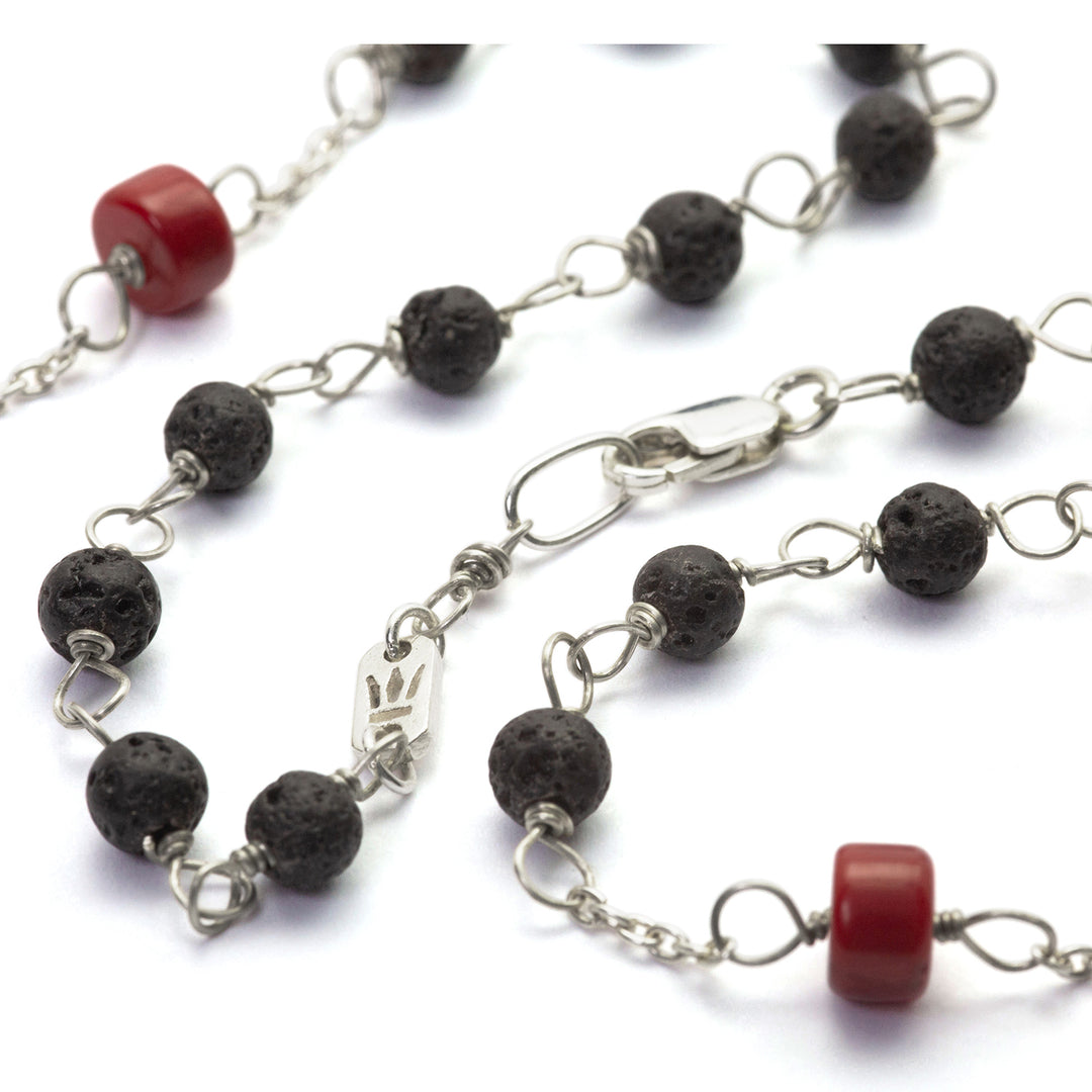"Transformation" necklace in sterling silver with lava and coral beads by Eternal Bliss