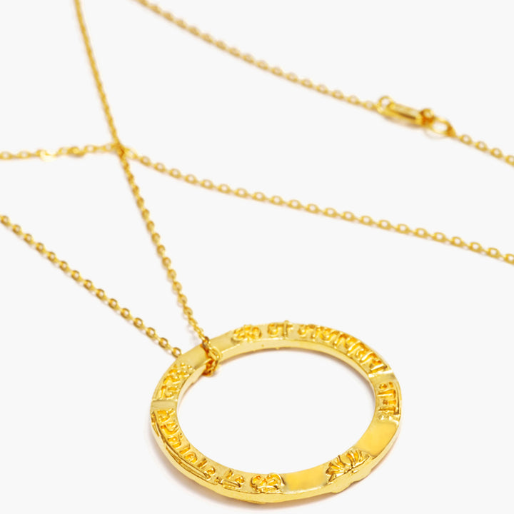 Ring shaped Ganesha Mantra pendant in gold plated sterling silver from ETERNAL BLISS from the spiritual yoga jewelry collection