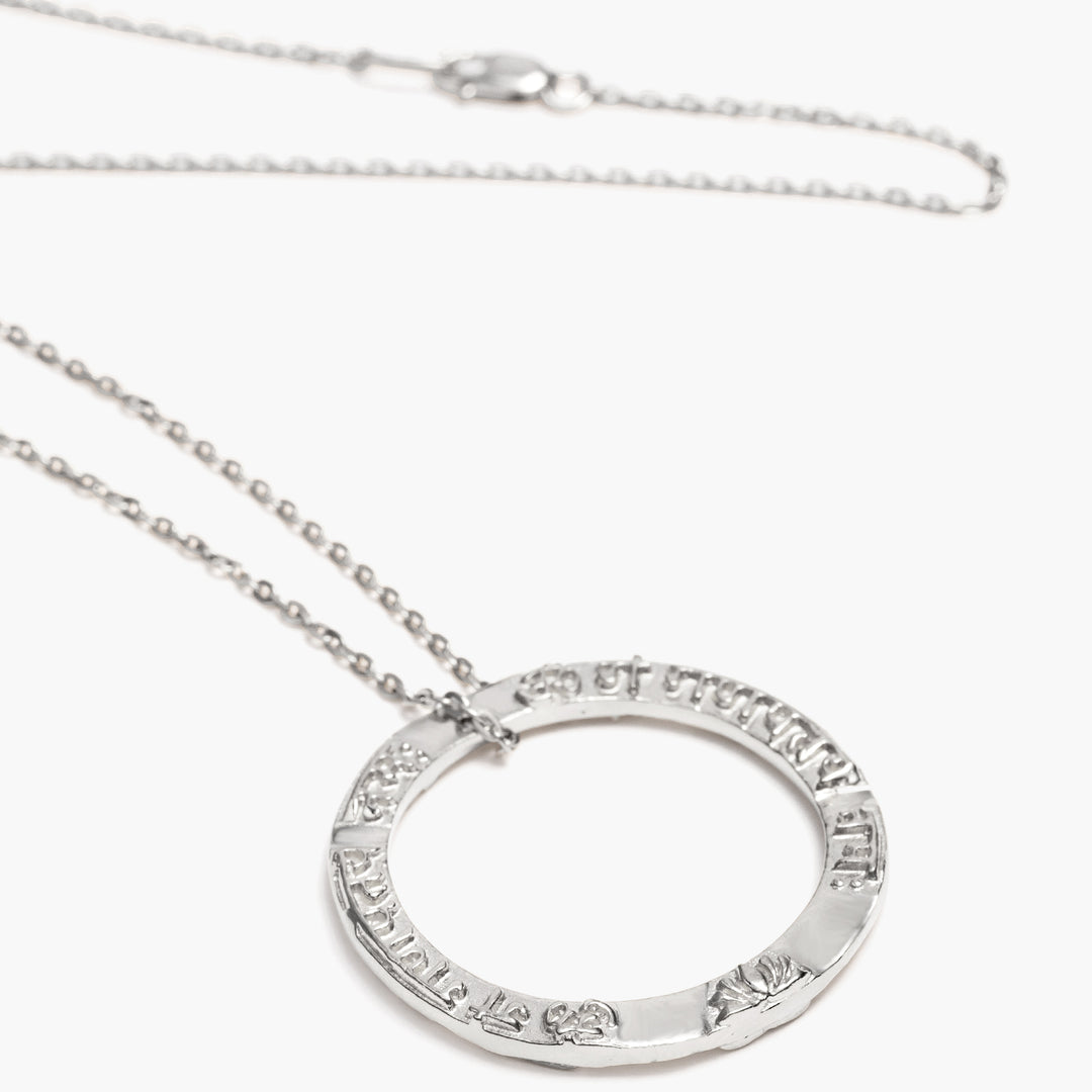 Ring shaped Ganesha Mantra pendant in sterling silver from ETERNAL BLISS from the spiritual yoga jewelry collection
