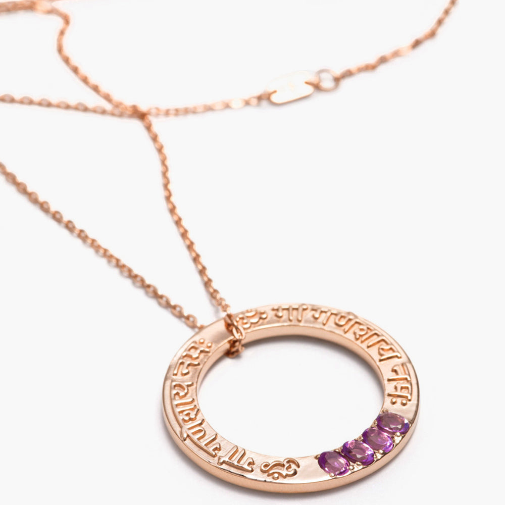 Ganesha Mantra pendant with raised Sanskrit writing in rose gold plated sterling silver and precious stones from ETERNAL BLISS from the spiritual yoga jewelery collection